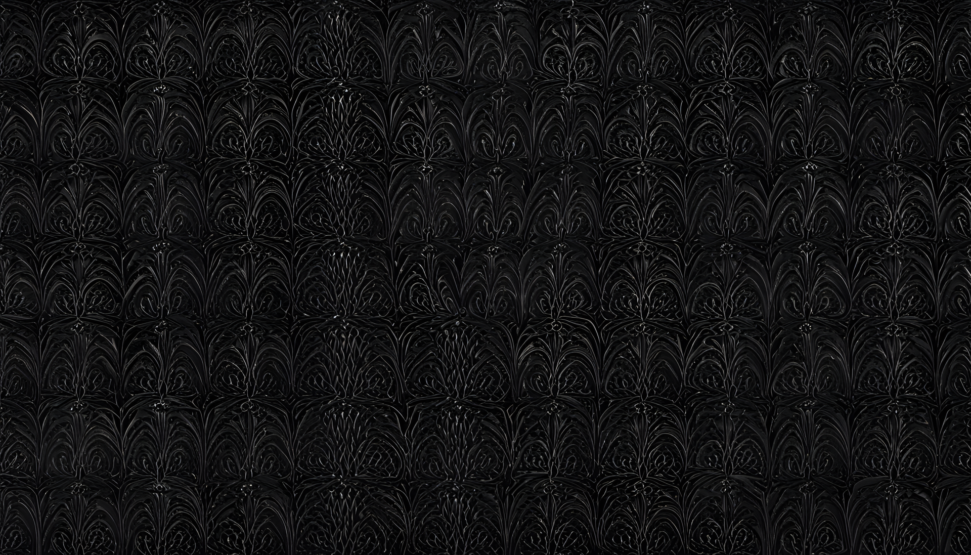 Abstract black wallpaper with intricate patterns and subtle textures.