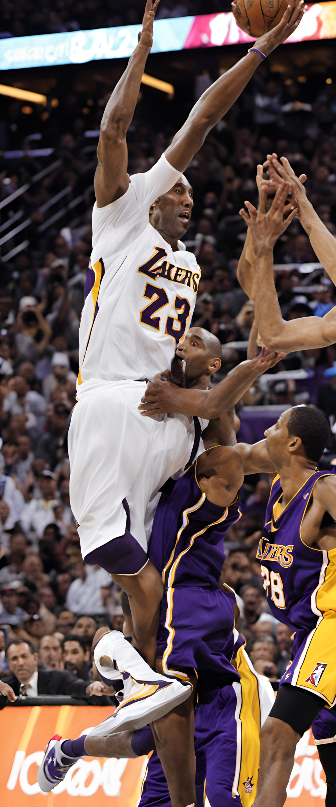 Kobe Bryant in action, showcasing his basketball skills.