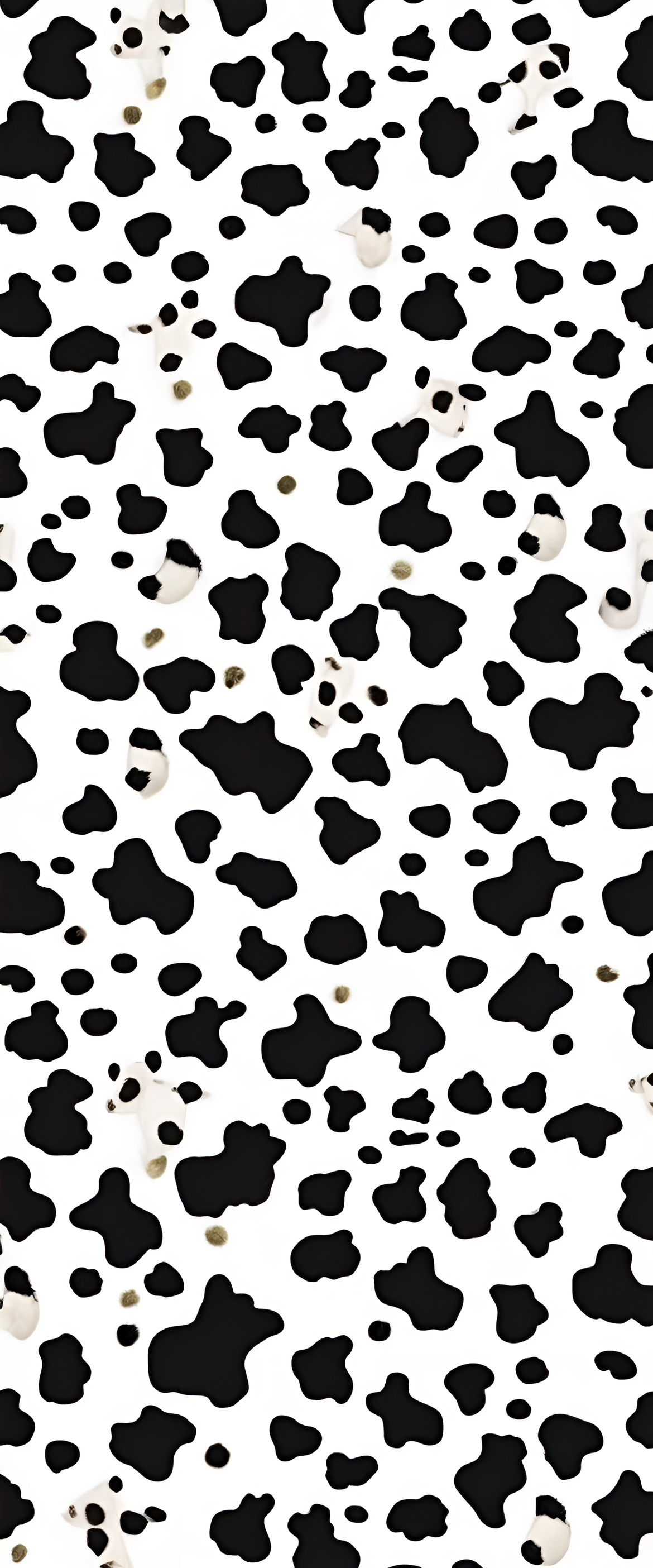 Colorful cow print wallpaper with a pattern of funny spots and shapes.