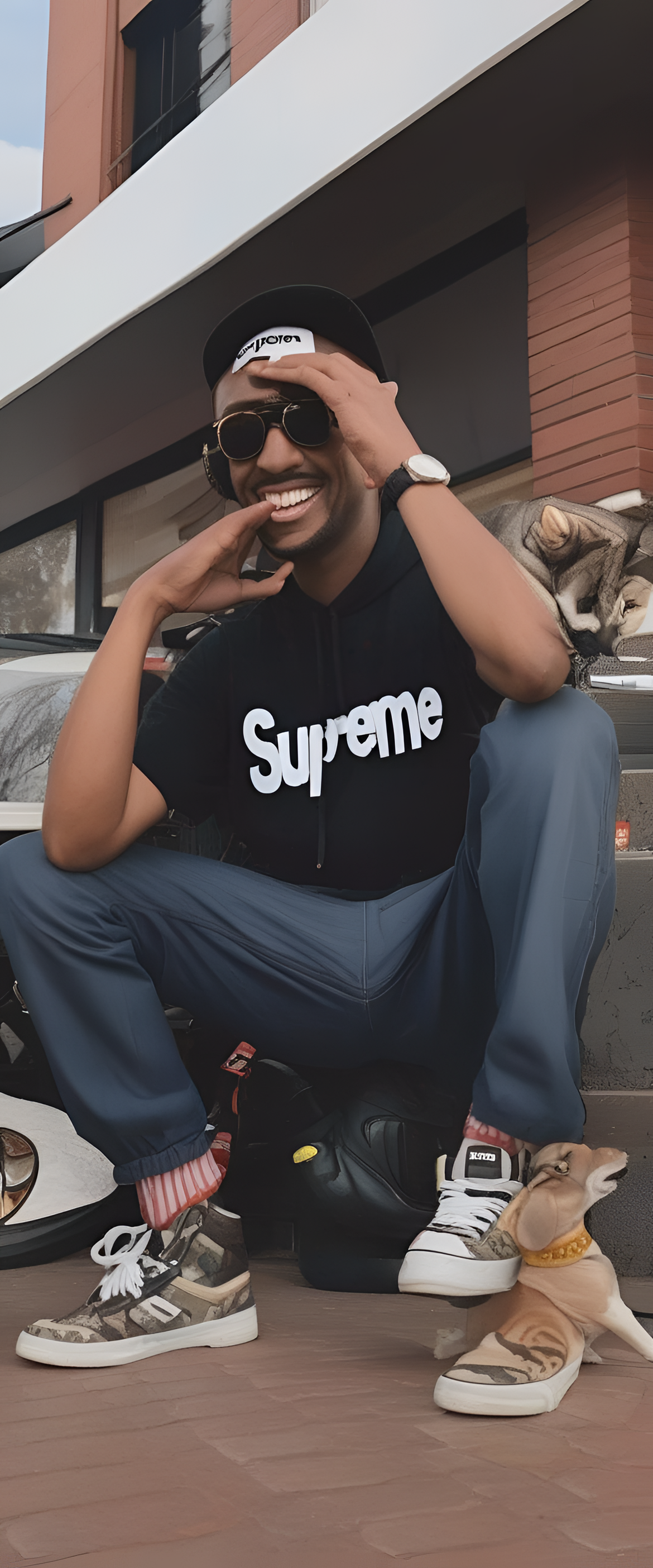 Colorful Supreme logo surrounded by playful graphics on a phone wallpaper.